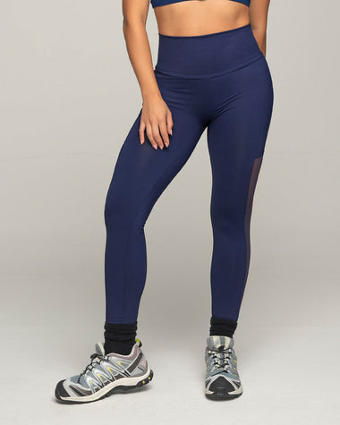 Legging deportivo con bolsillo lateral y detalles en tul#color_509-azul-oscuro