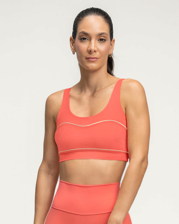 Top deportivo con tirantes dobles en espalda#color_369-coral