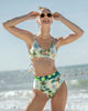 Top de bikini con copas extraíbles elaborado en pet reciclado#color_574-estampado-palmeras